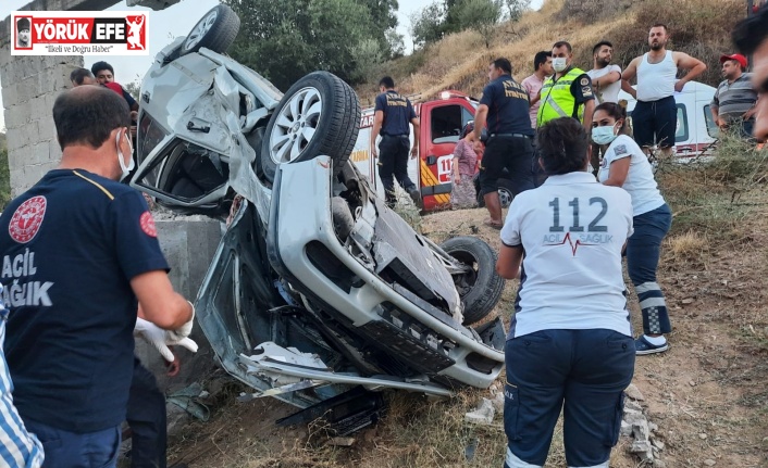 Sürücü takla atan otomobilde sıkışarak yaralandı