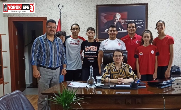 Kaymakam Baştürk başarılı sporcuları makamında ağırladı