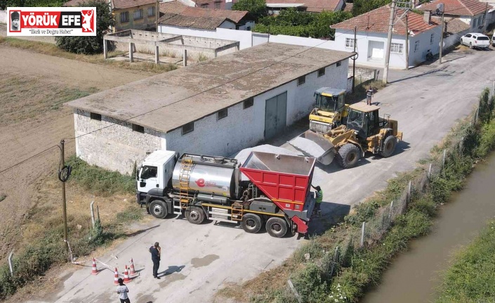 Efeler’de 15 yıllık yol sorunu asfalt aracıyla sona erdi
