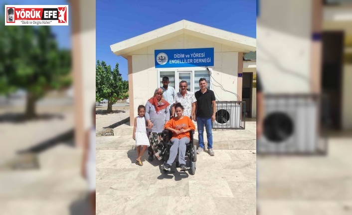 Didim’de engelli kıza tekerlekli sandalye verildi
