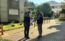 Emekli polis apartman görevlisini silahla yaraladı