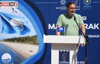 KUŞADASI’NDA MAVİ BAYRAKLAR GÖNDERE ÇEKİLDİ