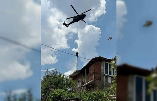 Evde çıkan yangın araziye sıçradı