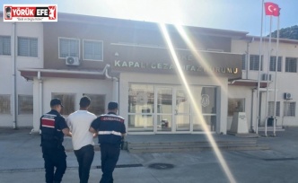 Kuşadası JASAT’tan sahilde operasyon: Aranan şahıs güneşlenirken yakalandı
