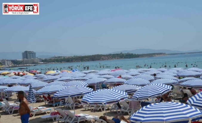 Didim’de sıcak hava bunalttı, tatilciler plaja akın etti